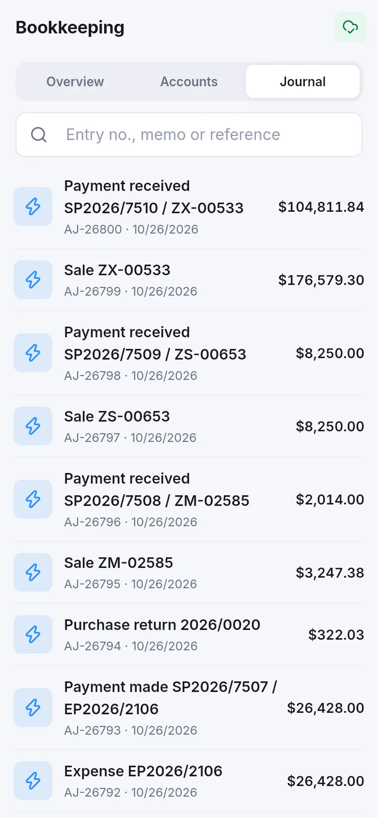 Journal tab in the app listing automatic entries for sales and payments