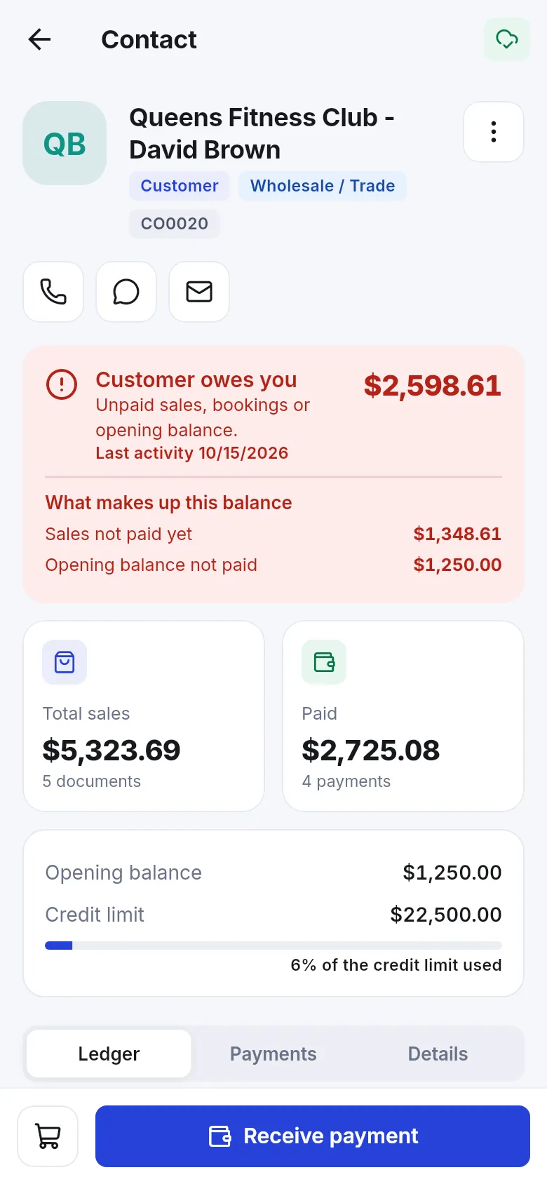 Customer page showing Customer owes you with the balance breakdown and a Receive payment button