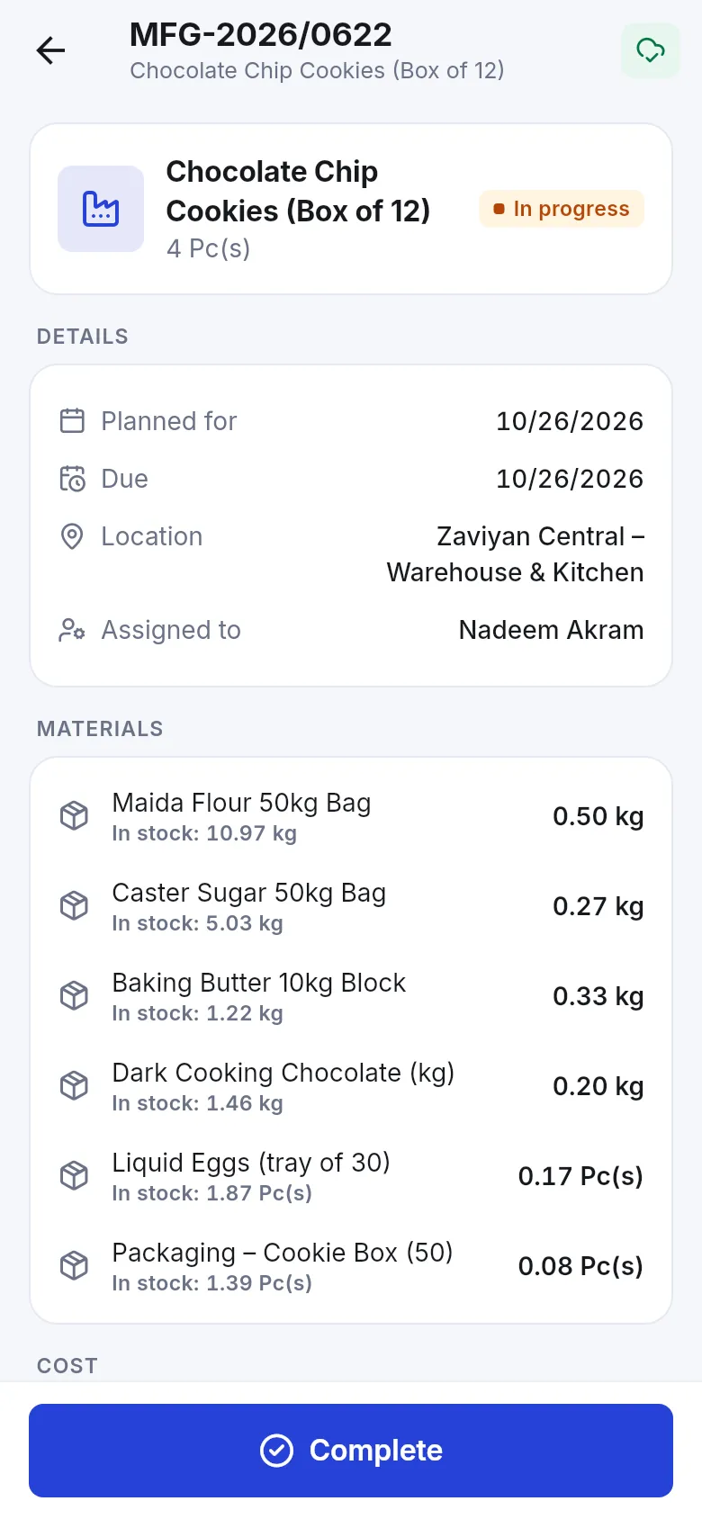 Production order detail in the app with materials and a Complete button